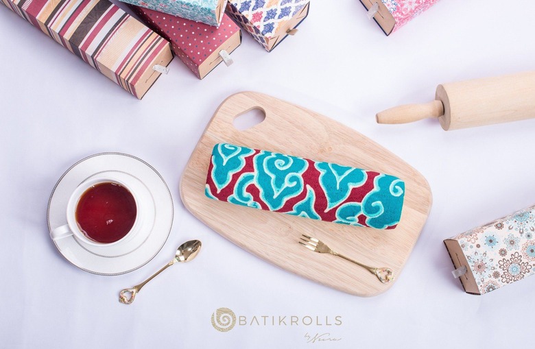 They look more like rolled-up beach towels than edible cakes.